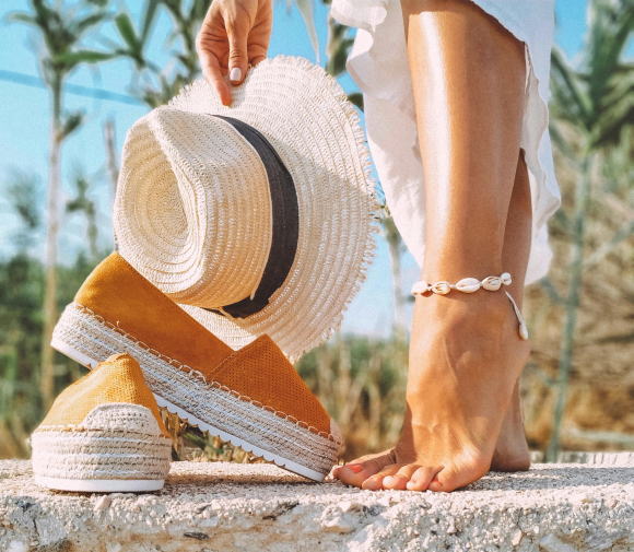 A straw hat and espadrilles